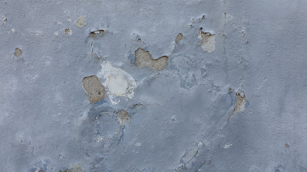 steps to scrape wall paint