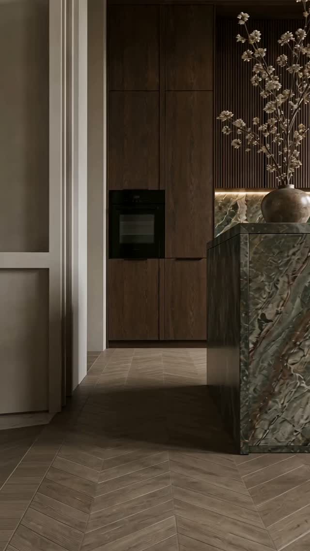 Dark Wood Floors Kitchen: 6 Looks That Balance the Floor 3 Dark wood herringbone flooring in a kitchen with dark wood cabinets and a marble island.