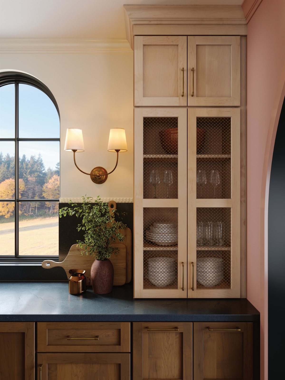 Dark Wood Floors Kitchen: 6 Looks That Balance the Floor 1 Light wood upper cabinets with mesh doors above dark wood lower cabinets and a black countertop.