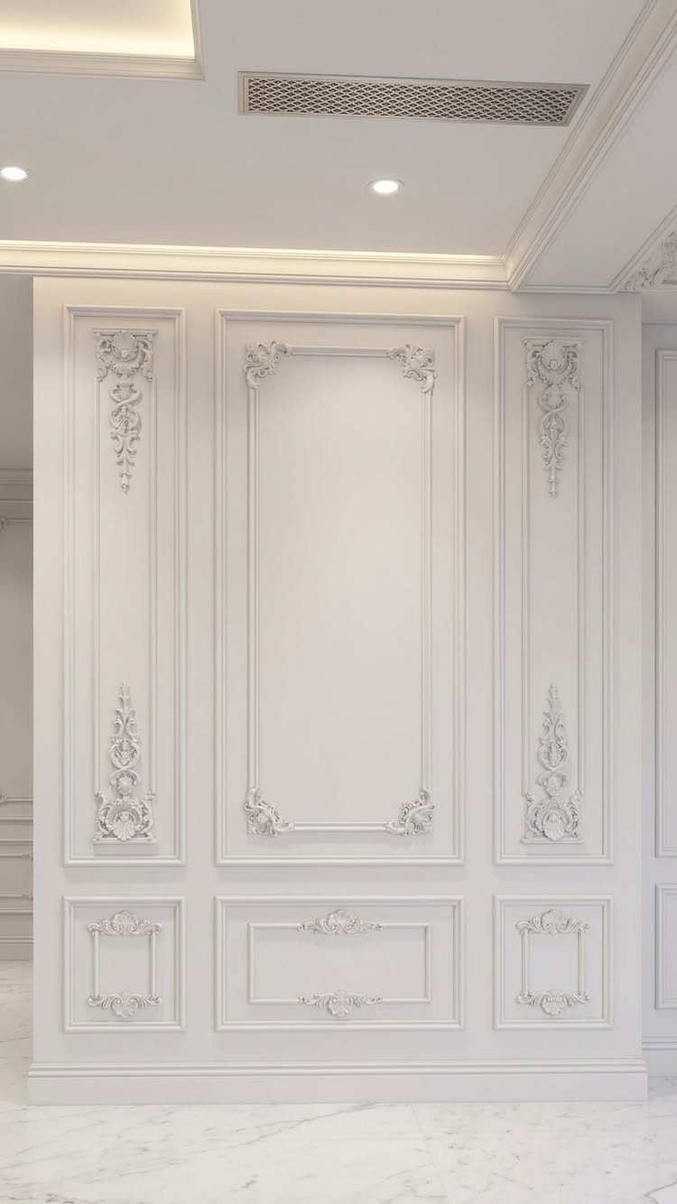 Molding Boxes on Wall: 6 Styles From Grid Panels to Botanical Frames 5 White decorative wall paneling with ornate classical molding and intricate floral relief carvings.