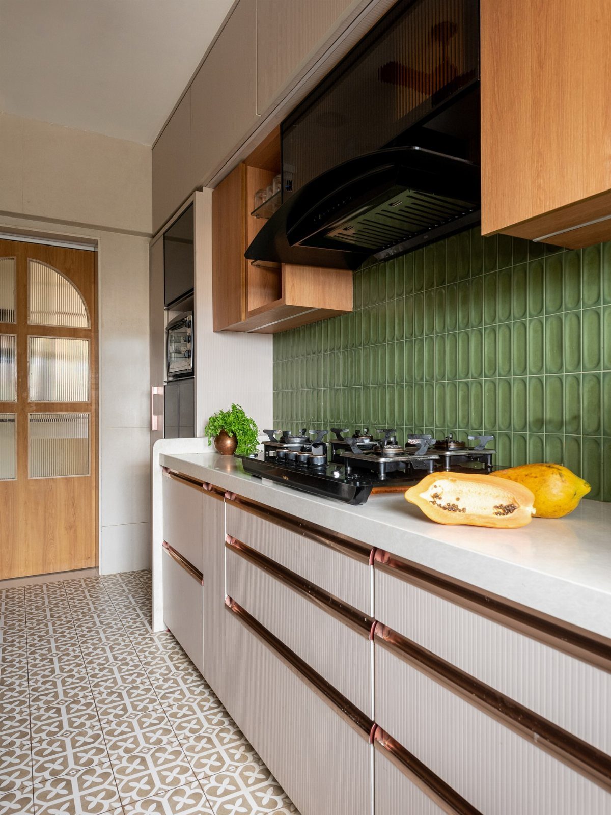Kitchen Floor Tiles Design: 13 Ideas for Stone, Ceramic & Patterned Floors 8 Modern kitchen with white cabinetry, green tiled backsplash, and patterned floor tiles.